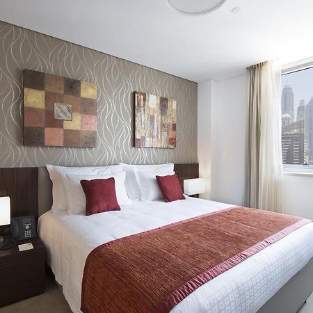 La Verda Suites And Villas Dubai Marina Exterior photo A bedroom at the hotel